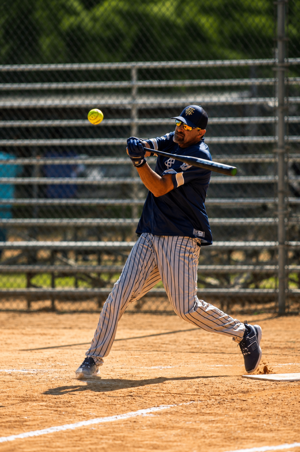 Player tracking a fly ball in the outfield